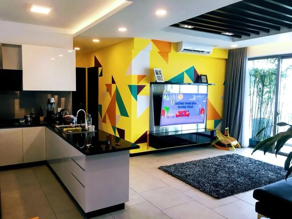 Yellow geometric residential mural